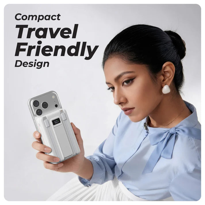 A woman showcasing the XECH X-Charge MAG PRO 10000mAh magnetic wireless power bank in compact travel-friendly design.